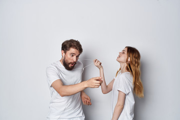 young couple in white t-shirts