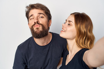 Obraz premium young couple on a light background