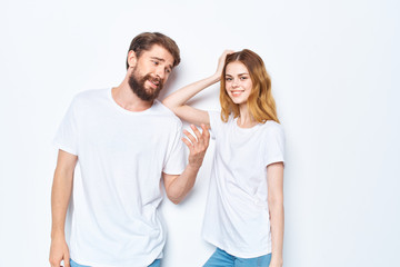 young couple in white t-shirts