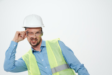 builder in a helmet with glasses