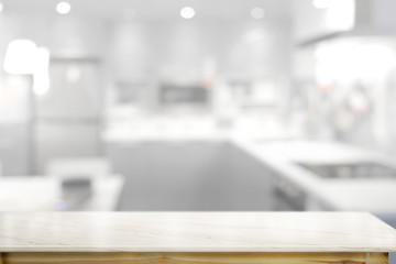 Marble top table and kitchen background.