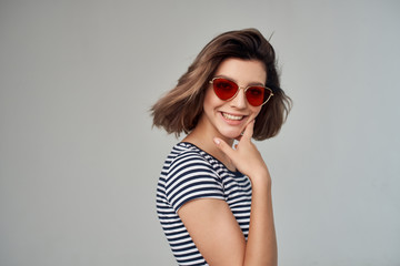 woman with a short haircut in glasses smile