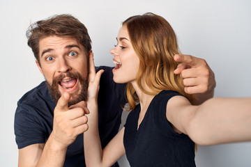 young couple in black t-shirts