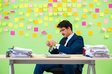 Businessman having trouble with his priorities