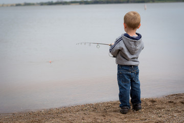 child fishing