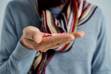 in the hands of pills treatment of vitamins disease
