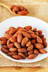 almond seeds on white plate