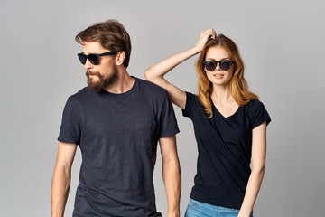 stylish young couple in black