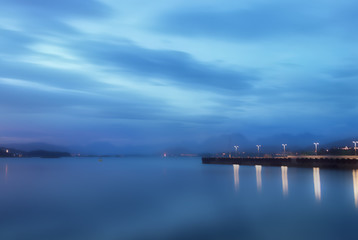 Fototapeta na wymiar Blured sea and dock background.