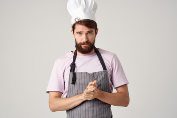 a fashionable apron and a head-dressed cook