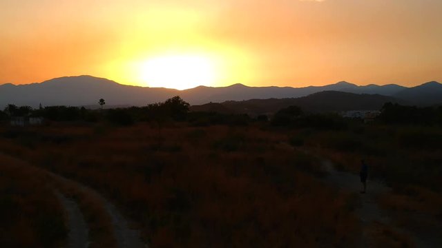 Summer evening sunset in Southern Spain, beautiful landscape images of the sun going down over the mountains in Southern Europe