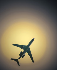 Naklejka na ściany i meble airliner in cloudless hot sky