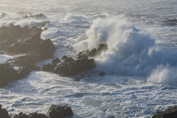 Splashing dramatic waves in ocean