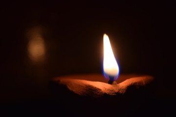 diwali diya lamp made of mud with oil in it