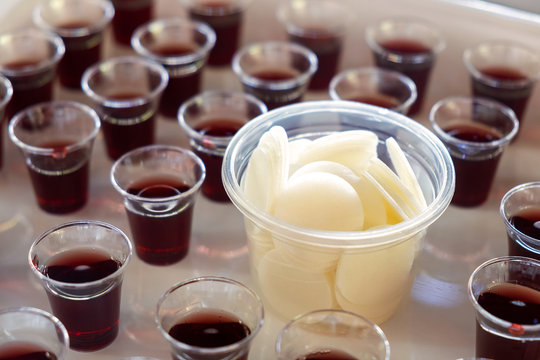 Many Cups of Wine and Bread set for a Holy Communion