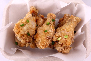  fried chicken with white backdrop.