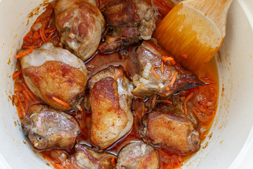 Duck with carrots and onions. The preparation of pilaf. Zirvak. Selective focus