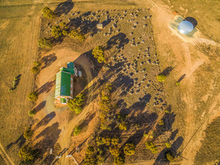 Looking down at small church somewhere in South Australian outback at sunset