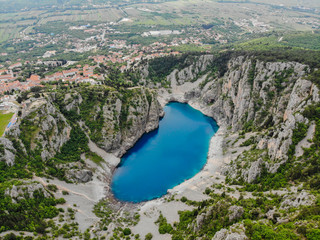 Blue Lake (Croatian: Modro jezero or Plavo jezero) is a karst lake located near Imotski in Croatia. It lies in a deep sinkhole possibly formed by the collapse of an enormous cave.