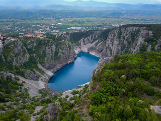 Blue Lake (Croatian: Modro jezero or Plavo jezero) is a karst lake located near Imotski in Croatia. It lies in a deep sinkhole possibly formed by the collapse of an enormous cave.