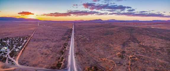 Vast plains of barren land in South Australia at sunset - aerial panorama