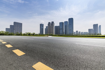 Panoramic skyline and modern business office buildings with empty road,empty concrete square floor