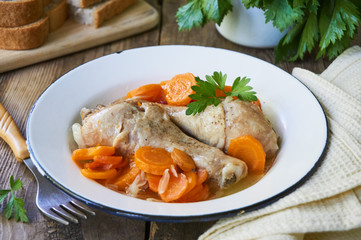 Stewed chicken legs with carrots