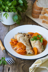Stewed chicken legs with carrots