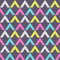 Abstract seamless pattern of triangular elements.