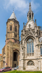 Fototapeta na wymiar View at the Peperbuse belfry and chapel of Saint Peter and Paul church in Ostend - Belgium
