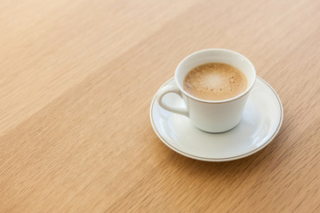 espresso coffee with cup and saucer on the wood table