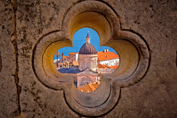 Dubrovnik landmarks view through stone carved detail