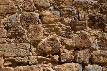 A fragment of the old stone masonry close-up.