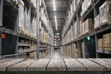 Empty wood Shelf on storage warehouse background
