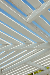 Obraz premium Construction of wooden planks on the background of blue sky