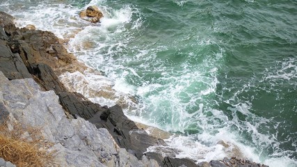 Beautiful tropical sea and steep rugged cliffs at Koh Sichang in Thailand,  Space for text in template, Travel concept, Many tourists visit here, View for seascape, Top view