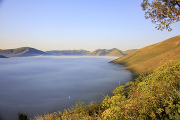 A magnificent sunrise in Castelluccio di Norcia. expecting more to the thousand colours of flowering 