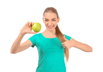 Young woman with apple on white background. Diet food concept