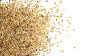 Mixed bird seed, millet pile isolated on white background, top view