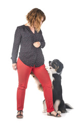 australian shepherd and woman