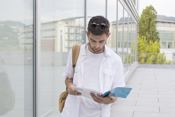 student portrait with notepad or outdoor books