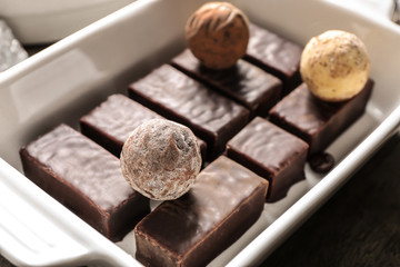 Dish with delicious chocolate candies