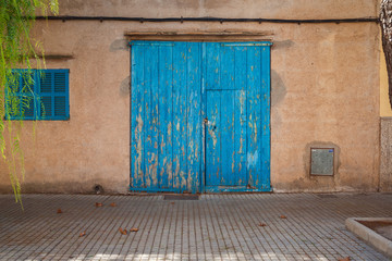 Colorful Weathered Barn frontal shot in surrounding - Mallorca