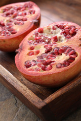 preparing fresh pomegranate