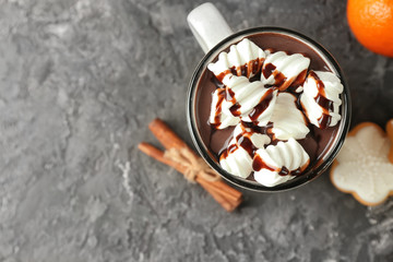 Cup of hot chocolate with marshmallows on table