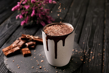 Cup of hot chocolate on slate plate