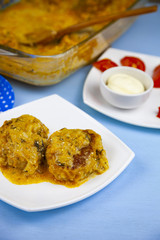 Delicious cutlets with tomato sauce