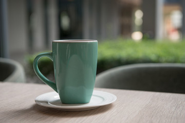 ceramic coffee cup on table