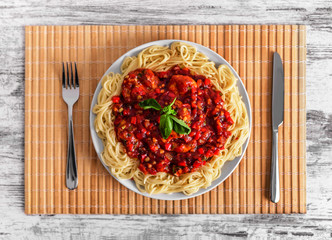 Spaghetti and pasta on a plate.