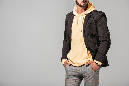 Partial View Of Male Model In Fashionable Autumn Outfit Isolated On Grey Background